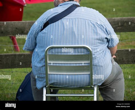 fat guy sitting in chair